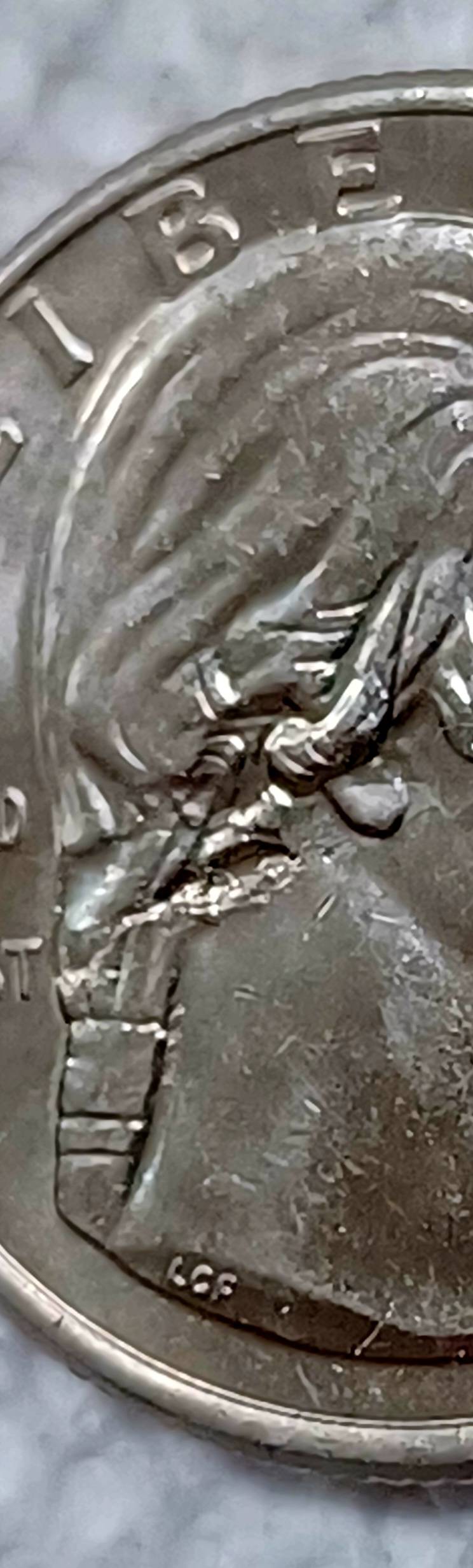 2022-P-Quarter-Maya-Angelou-Lamination-Planchet-Flaw-At-Hair-On-Obverse?